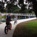 Cyclists approaching Milford Marina Footbridge